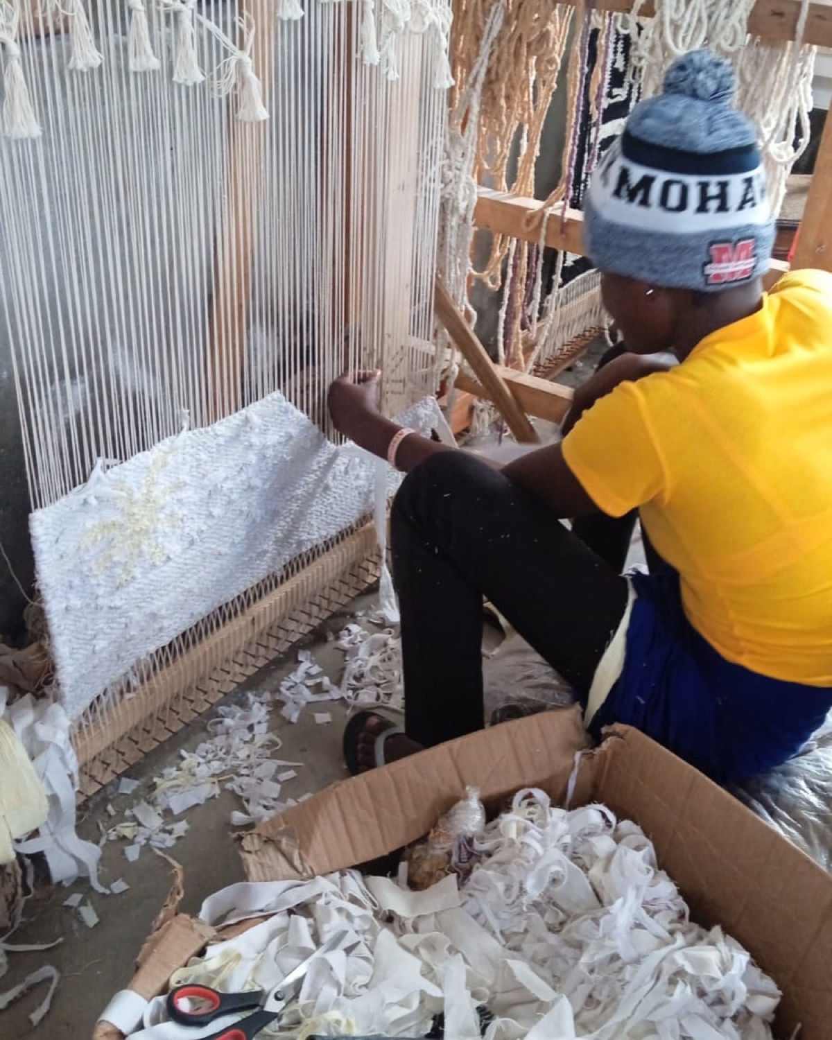 At the loom, Takaungu